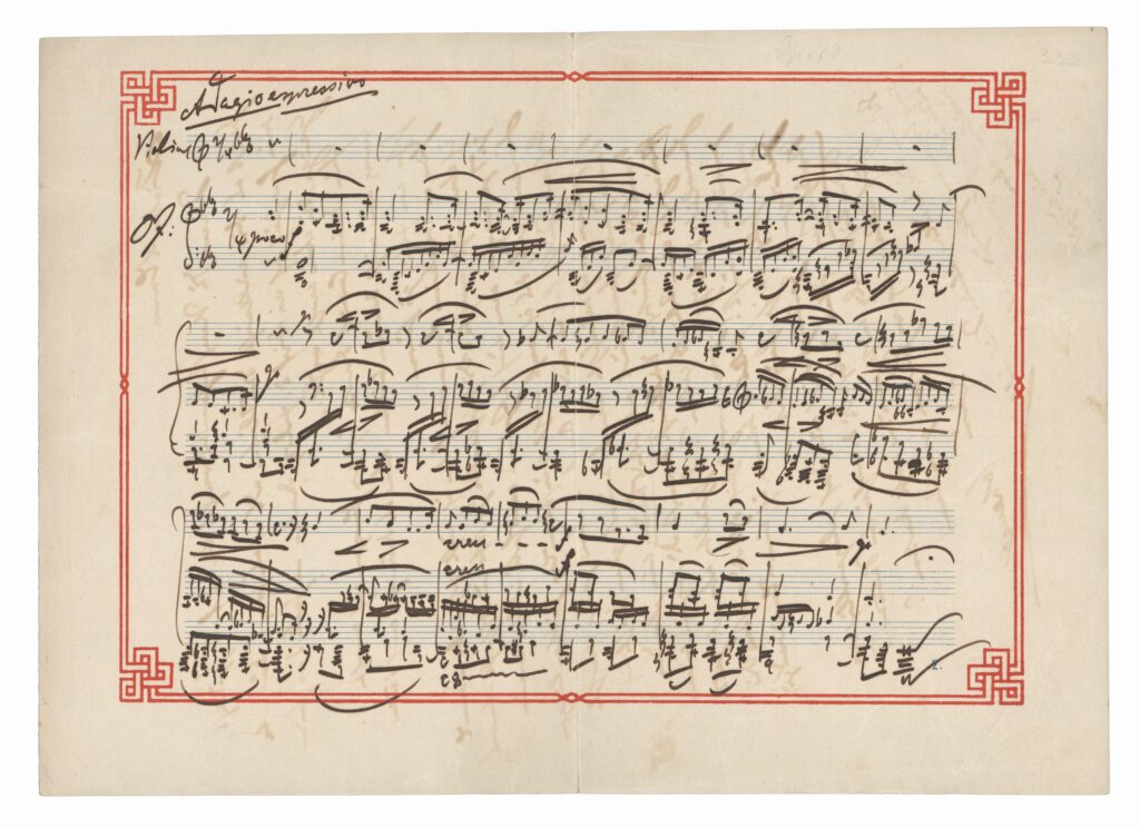 Handwritten music score with a decorative border